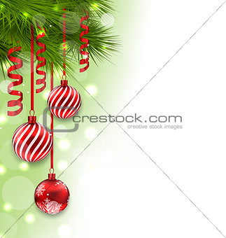 Christmas fir branches and glass balls, copy space for your text