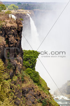 The Victoria falls with mist from water