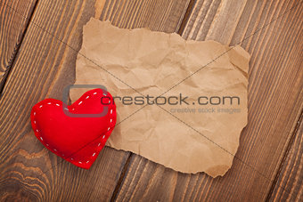Blank old piece of paper and vintage handmaded valentines day heart