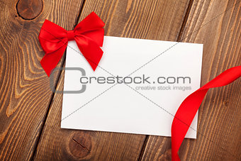 Valentines day greeting card with red ribbon