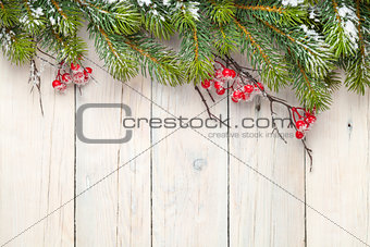 Christmas wooden background with fir tree