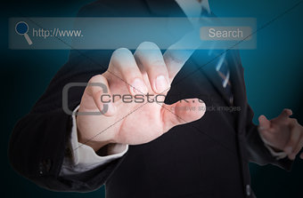 Businessman touching button for search 
