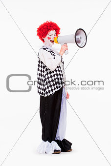 Clown in Red Wig and Makeup Using Megaphone.