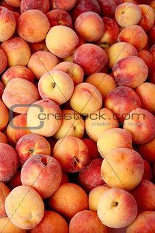 Fresh organic peaches  background, photo taken at local farmers 