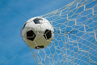 Soccer ball in the goal after shooted 