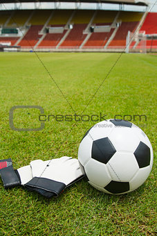Soccer ball and goldkeeper gloves set for shoot  