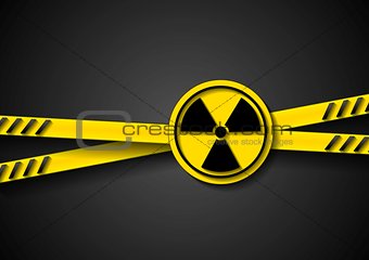 Danger tape abstract background with radiation symbol