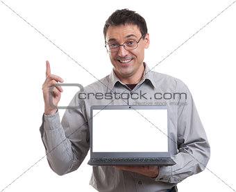 portrait of confident young man advertising laptop