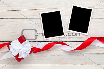 Photo frames and gift box with ribbons