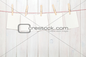 Photo frames hanging on rope