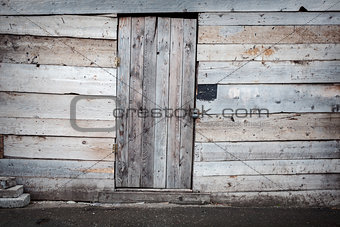 Old wooden plank door 