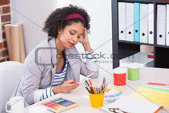 Interior designer looking at colour wheel