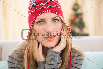Portrait of a pretty blonde in winter hat
