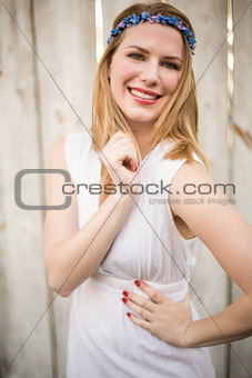 Portrait of a smiling blonde woman wearing headband
