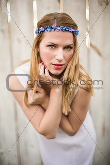 Pretty blonde woman posing while wearing headband