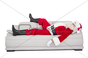 Santa claus sleeping on the couch