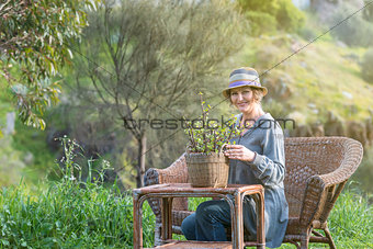 Woman in nature with   plant