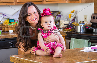 Woman and Baby in Kitchen