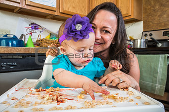 Mother Smiles With Baby