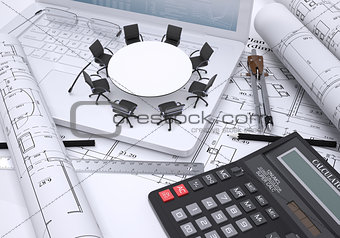 Miniature round table with chairs placed on laptop, calculator and few other tools