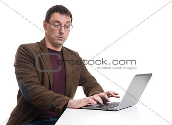 young man working on laptop computer