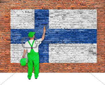 House painter covers wall with flag of Finland