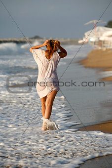 Woman at coastline