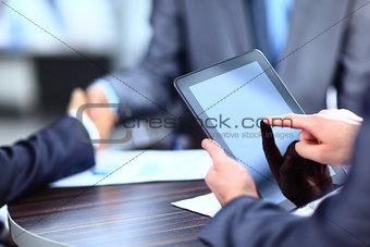man holding digital tablet