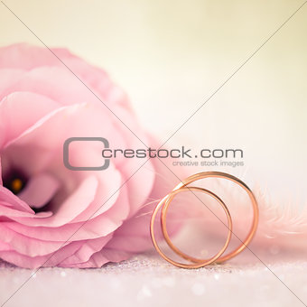Love Wedding Background with Gold Rings and Beautiful Flower