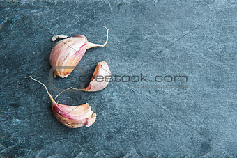 Closeup on garlic on stone substrate