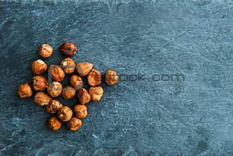 Closeup on hazelnuts on stone substrate