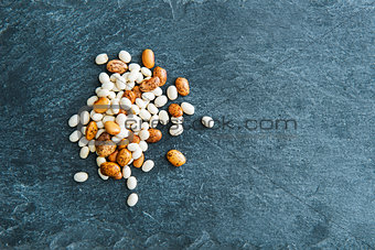 Closeup on beans on stone substrate