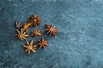 Closeup on star anise on stone substrate