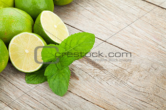 Fresh ripe limes with mint