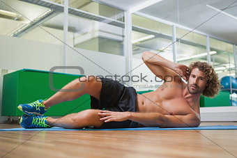 Portrait of a shirtless man doing fitness exercise