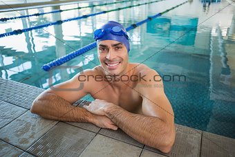 Portrait of swimmer in pool at leisure center