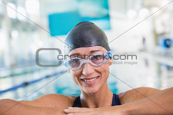 Female swimmer in pool at leisure center