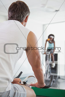 Spinning instructor motivating her class