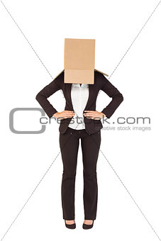 Businesswoman with box over head