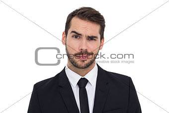 Portrait of a skeptical businessman well dressed