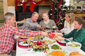 Three generation family having christmas dinner together