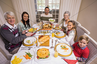 Three generation family during christmas dinner together