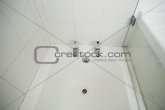 Overhead of white bath tub