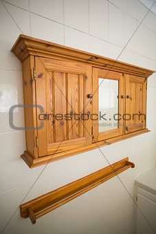 Wooden shelves on kitchen wall