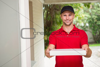 Pizza delivery man delivering pizzas