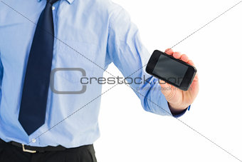 Close up of businessman holding a phone