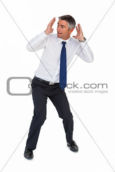 Businessman bending and with head between hands