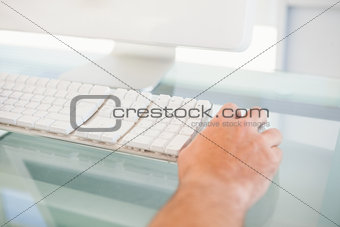 Close up of a man using mouse