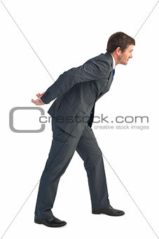 Businessman leaning over