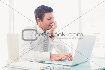 A businessman working at desk